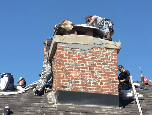 Laguna Niguel Chimney Sweep installing a custom chimney crown in Laguna Niguel, CA