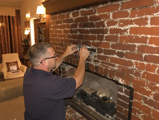 Laguna Niguel Chimney Sweep expert fixing a fireplace in Laguna Niguel, CA